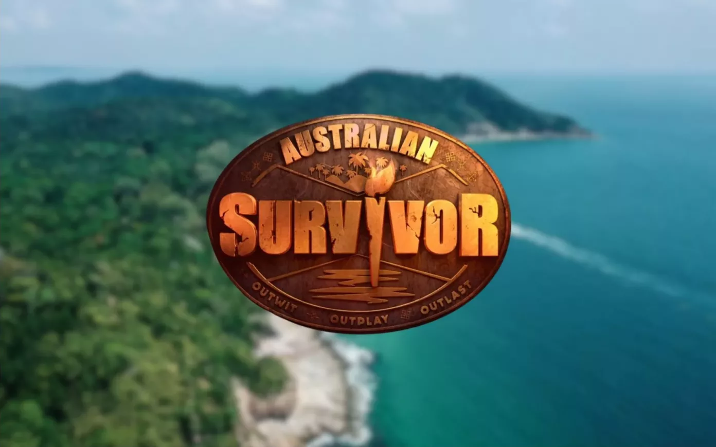 Australian Survivor logo over a blurred tropical island coastline and turquoise ocean.